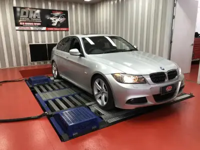 BMW 1 Series 2L ECU remap — BMW 3 Series E90 M Sport silver on the DTA Mainline dyno — ECU remap Sydney