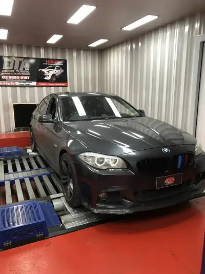 BMW 5 Series F10 M Sport grey — front 3/4 on the DTA dyno, ECU remap Sydney