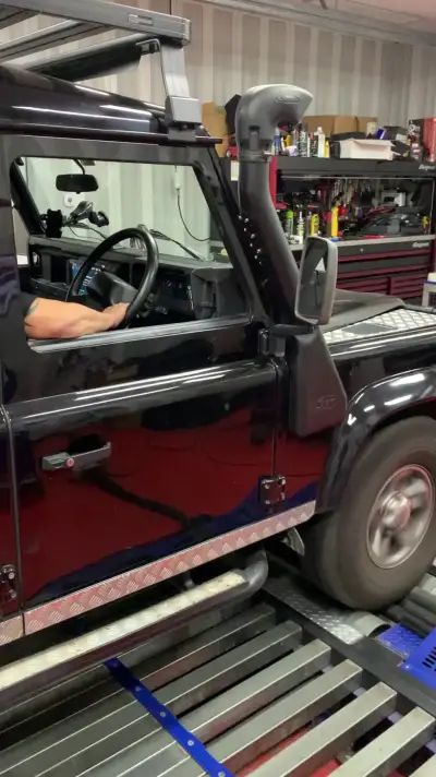 Land Rover Defender black with snorkel — custom ECU remap on the DTA dyno