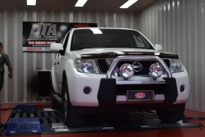 Nissan Navara D40 white with chrome bull bar — ECU remap on the dyno