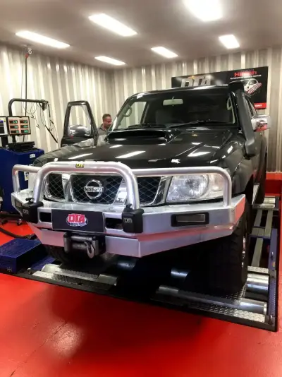 Nissan Navara 2.3L ECU remap — Nissan Patrol GU (Y61) black with bull bar and winch — dyno ECU remap Sydney