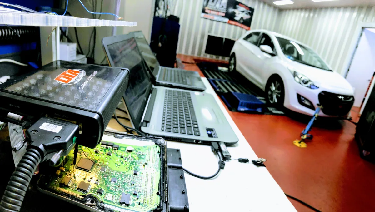 ECU tuning software on dual laptop setup